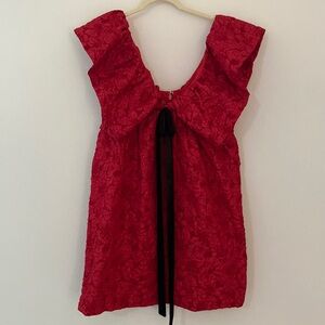 Red dress with velvet black bow